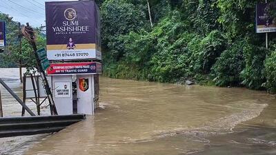 A view of the highway covered with flood water as the water level rises due to heavy rain at Kalimpong, in Darjeeling on October 5 (ANI Video Grab/ FILE IMAGE) A view of the highway covered with flood water as the water level rises due to heavy rain at Kalimpong, in Darjeeling on October 5 (ANI Video Grab/ FILE IMAGE)