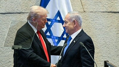 U.S. President Donald Trump and Israeli Prime Minister Benjamin Netanyahu at the Knesset, Israel's unicameral legislature, in Jerusalem on Monday. (@IsraeliPM X) U.S. President Donald Trump and Israeli Prime Minister Benjamin Netanyahu at the Knesset, Israel's unicameral legislature, in Jerusalem on Monday. (@IsraeliPM X)