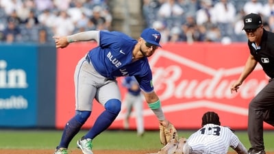 Bo Bichette, 27, had hoped to return from a knee sprain suffered in a collision at home plate against the Yankees on Sept. 6. (Getty Images via AFP) Bo Bichette, 27, had hoped to return from a knee sprain suffered in a collision at home plate against the Yankees on Sept. 6. (Getty Images via AFP)