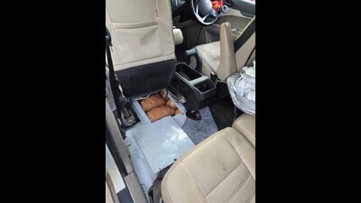 During a thorough search, officers recovered 111 packets — 59 from one vehicle and 52 from the other — each wrapped in khaki-coloured plastic tape and hidden inside specially designed compartments in the cars’ floors. (HT)