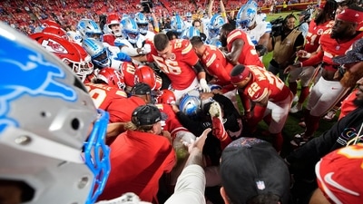 Detroit Lions safety Brian Branch (32) and Kansas City Chiefs wide receiver Juju Smith-Schuster (9) get into a fight after the game at GEHA Field at Arrowhead Stadium. (IMAGN IMAGES via Reuters Connect, Mandatory Credit: Jay Biggerstaff-Imagn Images)