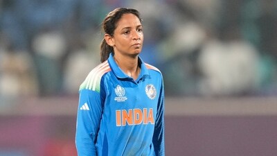 India's captain Harmanpreet Kaur leaves the field after their loss in the ICC Women's Cricket World Cup match against Australia (AP) India's captain Harmanpreet Kaur leaves the field after their loss in the ICC Women's Cricket World Cup match against Australia (AP)