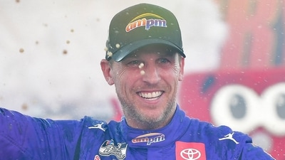 NASCAR Cup Series driver Denny Hamlin (11) celebrates his victory following the South Point 400 at Las Vegas Motor Speedway. (IMAGN IMAGES via Reuters Connect)
