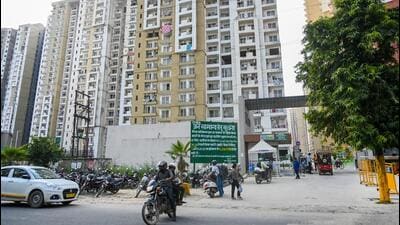 Noida authority CEO Lokesh M defended the step as a transparency measure, saying: “This is not a coercive action. The boards are being installed on government land to inform the public about developers who have not cleared their dues despite multiple notices.” (Sunil Ghosh/HT Photo) Noida authority CEO Lokesh M defended the step as a transparency measure, saying: “This is not a coercive action. The boards are being installed on government land to inform the public about developers who have not cleared their dues despite multiple notices.” (Sunil Ghosh/HT Photo)