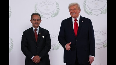 US President Donald Trump and MoS for external affairs Kirti Vardhan Singh at the Gaza peace summit on Monday. (REUTERS) US President Donald Trump and MoS for external affairs Kirti Vardhan Singh at the Gaza peace summit on Monday. (REUTERS)