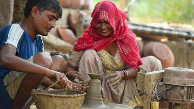 Gram it: Here's how artisans in NCR are working day and night, with smiles on their faces, to brighten up your Diwali. These are some skilled potters of Jakhopur, a village in Gurugram's Sohna block, who are full of festive spirit as they give shape to earthen lamps (diyas) and other artefacts by spinning the wheel. (Photo: Parveen Kumar/HT )