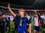 Japan's Ritsu Doan celebrates his team's victory at the end of the international football friendly match between against Brazil at the Tokyo stadium in Chofu Japan's Ritsu Doan celebrates his team's victory at the end of the international football friendly match between against Brazil at the Tokyo stadium in Chofu