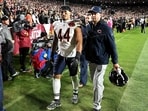 Noah Sewell of the Chicago Bears exits the field against the Washington Commanders during the second quarter at Northwest Stadium on October 13.
