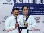 Karnal girl Rishita Dang with her coach. (HT Photo) Karnal girl Rishita Dang with her coach. (HT Photo)