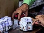 The drugs department seal Coldrif cough syrup containers during raid in Chhindwara on Sunday. 