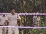 West Bengal police personnel during a reconstruction of the crime scene as part of the ongoing probe into the medical student’s rape case in Durgapur on Tuesday.