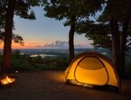 Experience starry nights, bonfires, and nature’s beauty across India’s mountains, deserts, rivers, and beaches.(Unsplash)