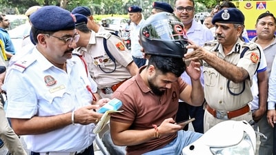 Delhi Traffic Police encourages riders to wear helmets during 'Consequences,' a road safety campaign on helmet wearing in New Delhi. (ANI) Delhi Traffic Police encourages riders to wear helmets during 'Consequences,' a road safety campaign on helmet wearing in New Delhi. (ANI)