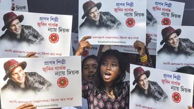All Assam Students' Union (AASU) members hold posters during a protest demanding justice for late music icon Zubeen Garg, in Guwahati, on Tuesday. (PTI) All Assam Students' Union (AASU) members hold posters during a protest demanding justice for late music icon Zubeen Garg, in Guwahati, on Tuesday. (PTI)