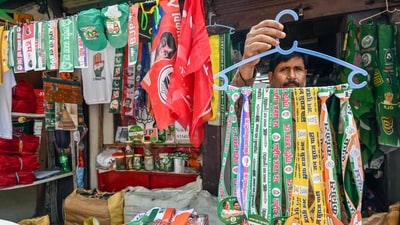 Patna, Oct 13 (ANI): A vendor sell election campaign materials like flags, badges and masks ahead of the Bihar legislative assembly elections, in Patna on Wednesday. (ANI Photo) (Rahul Sharma) Patna, Oct 13 (ANI): A vendor sell election campaign materials like flags, badges and masks ahead of the Bihar legislative assembly elections, in Patna on Wednesday. (ANI Photo) (Rahul Sharma)