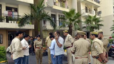 Ghaziabad, India – Oct. 14, 2025: UP Police personnel inspect the site where a man allegedly shot and killed his wife at Ajnara Integrated Society in Raj Nagar Extension. ACP Nandgram, Upasana Pandey, reached the spot to oversee the investigation, in Ghaziabad, India, on Tuesday, October 14, 2025. (Photo by Sakib Ali / Hindustan Times) (Sakib Ali/HT Photo) Ghaziabad, India – Oct. 14, 2025: UP Police personnel inspect the site where a man allegedly shot and killed his wife at Ajnara Integrated Society in Raj Nagar Extension. ACP Nandgram, Upasana Pandey, reached the spot to oversee the investigation, in Ghaziabad, India, on Tuesday, October 14, 2025. (Photo by Sakib Ali / Hindustan Times) (Sakib Ali/HT Photo)