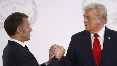 Trump's stern words to Emmanuel Macron during tense handshake at Egypt summit revealed by lip reader (Yoan Valat/Pool via REUTERS) (via REUTERS)
