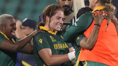 South Africa's Nadine de Klerk celebrates with teammates after South Africa won the ICC Women's World Cup 2025 ODI cricket match against India. (PTI) South Africa's Nadine de Klerk celebrates with teammates after South Africa won the ICC Women's World Cup 2025 ODI cricket match against India. (PTI)