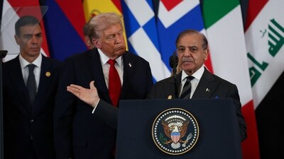 Pakistani Prime Minister Shehbaz Sharif speaks next to US President Donald Trump during world leaders' summit on ending the Gaza war in Sharm el-Sheikh, Egypt, October 13, 2025. (Reuters)