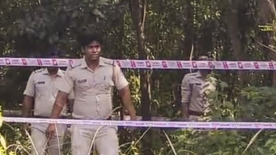 West Bengal police personnel during a reconstruction of the crime scene as part of the ongoing probe into the medical student’s rape case in Durgapur on Tuesday. (PTI) West Bengal police personnel during a reconstruction of the crime scene as part of the ongoing probe into the medical student’s rape case in Durgapur on Tuesday. (PTI)
