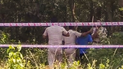 West Bengal police personnel during reconstruction of the crime scene as part of the ongoing probe into the medical student rape case, in Durgapur. (PTI) West Bengal police personnel during reconstruction of the crime scene as part of the ongoing probe into the medical student rape case, in Durgapur. (PTI)