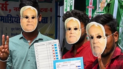 Janata Dal (United) supporters wear masks of CM Nitish Kumar and hold EVM replicas as they gear up for the Bihar assembly elections 2025 (PTI) Janata Dal (United) supporters wear masks of CM Nitish Kumar and hold EVM replicas as they gear up for the Bihar assembly elections 2025 (PTI)