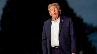 US President Donald Trump on the South Lawn of the White House after arriving on Marine One in Washington (Bloomberg)