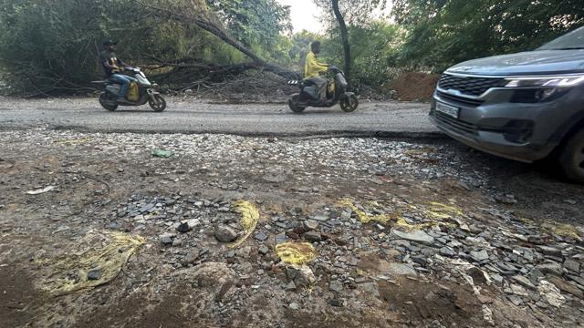The dilapidated condition of the main road leading to Sector 56. (Parveen Kumar/HT Photo) The dilapidated condition of the main road leading to Sector 56. (Parveen Kumar/HT Photo)