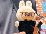 Apple CEO Tim Cook gets custom Labubu doll in China. Apple CEO Tim Cook gets custom Labubu doll in China.