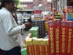 Crackers on sale near Jama Masjid on Wednesday afternoon. (Arvind Yadav/HT Photo) Crackers on sale near Jama Masjid on Wednesday afternoon. (Arvind Yadav/HT Photo)