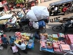 People purchase green crackers ahead of Diwali near the Jama Masjid area in New Delhi on Wednesday. (Arvind Yadav/HT Photo) People purchase green crackers ahead of Diwali near the Jama Masjid area in New Delhi on Wednesday. (Arvind Yadav/HT Photo)