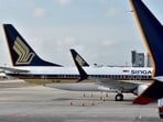 The levy will be paid to the Civil Aviation Authority of Singapore.