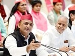 Samajwadi Party president Akhilesh Yadava addressing reporters at the party office in Lucknow on Wednesday. (HT )