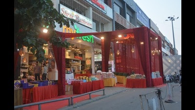 A shop in Panchkula’s Sector 9 blatantly encroaching upon on a walkway, limiting space for movement of shoppers. (Sant Arora/HT)