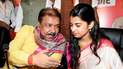 Patna, Oct 14 (ANI): BJP Bihar President Dilip Jaishwal interacts with playback singer Maithili Thakur as she joins the party during Milan Samaroh, in Patna on Tuesday. (ANI Photo) (Rahul Sharma) Patna, Oct 14 (ANI): BJP Bihar President Dilip Jaishwal interacts with playback singer Maithili Thakur as she joins the party during Milan Samaroh, in Patna on Tuesday. (ANI Photo) (Rahul Sharma)