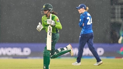 Pakistan's Omaima Sohail runs to pavilion as it rains during (AP) Pakistan's Omaima Sohail runs to pavilion as it rains during (AP)