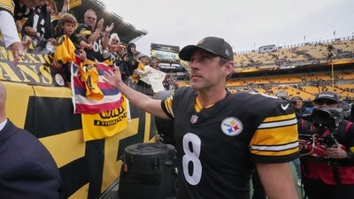 Pittsburgh Steelers quarterback Aaron Rodgers walks off the field after the NFL side defeated the Cleveland Browns. (AP) Pittsburgh Steelers quarterback Aaron Rodgers walks off the field after the NFL side defeated the Cleveland Browns. (AP)