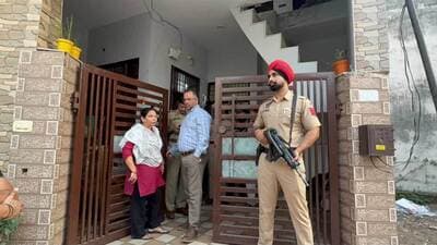 Dera Bassi police at the family’s house after the murder. (HT Photo) Dera Bassi police at the family’s house after the murder. (HT Photo)