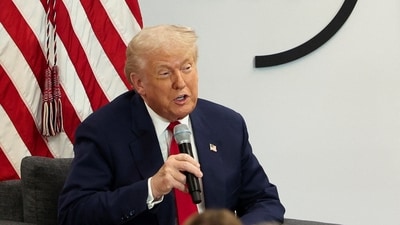 Under new DHS rules, non-US citizens must carry proof of registration, with failure resulting in fines or jail. (REUTERS)