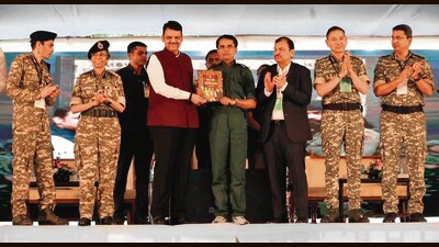 Former senior Maoist leader Mallojula Venugopal Rao with Maharashtra CM Devendra Fadnavis at Gadchiroli after his surrender, on Wednesday (HT) Former senior Maoist leader Mallojula Venugopal Rao with Maharashtra CM Devendra Fadnavis at Gadchiroli after his surrender, on Wednesday (HT)