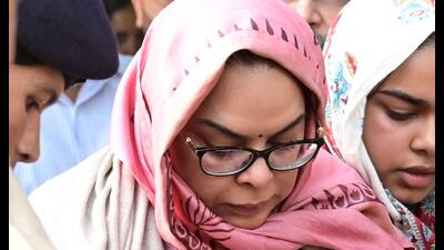 IAS officer Amneet P Kumar, wife of late IPS Y Puran Singh, during his last rites in Chandigarh on Wednesday. (Ravi Kumar/HT) IAS officer Amneet P Kumar, wife of late IPS Y Puran Singh, during his last rites in Chandigarh on Wednesday. (Ravi Kumar/HT)