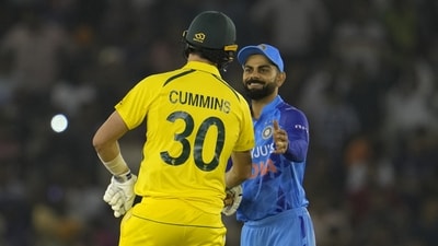 Virat Kohli and Pat Cummins interact during a white-ball match between Australia and India. (AP) Virat Kohli and Pat Cummins interact during a white-ball match between Australia and India. (AP)