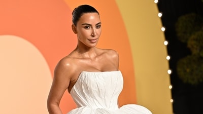 Kim Kardashian revealed that Kanye West once gave away their Lamborghinis during a manic episode. (Evan Agostini/Invision/AP) Kim Kardashian revealed that Kanye West once gave away their Lamborghinis during a manic episode. (Evan Agostini/Invision/AP)