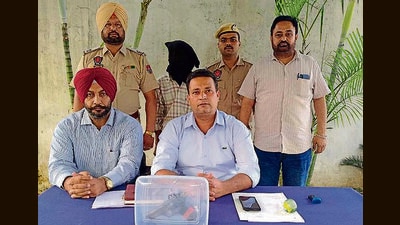 One of the accused in police custody in Ludhiana. (HT Photo) One of the accused in police custody in Ludhiana. (HT Photo)