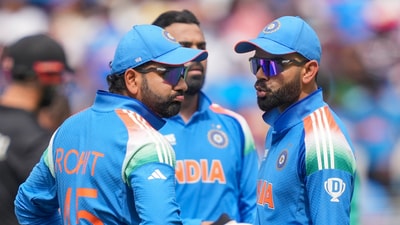 Virat Kohli talks to Rohit Sharma (PTI) Virat Kohli talks to Rohit Sharma (PTI)
