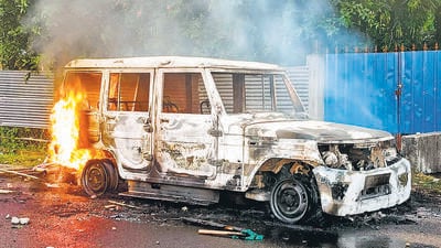 Smoke billows from a vehicle torched during a protest in Baksa on Wednesday. (ANI) Smoke billows from a vehicle torched during a protest in Baksa on Wednesday. (ANI)