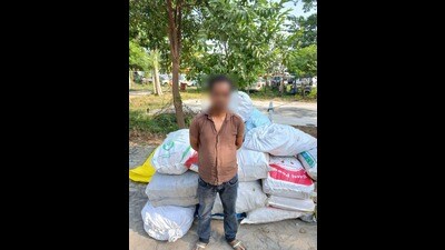 The arrested accused, Haseeb, with the cache of illegal crackers (HT Photo)