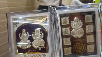 This year, silver coins printed with images of Laxmi, Ganesh and Saraswati, packed carefully with essential items for puja like roli, rice and kalewa, dhoop and havan cups, silver-embedded photo frames, vastu items like shree charan and shree yantra are widely available in the market. (HT) This year, silver coins printed with images of Laxmi, Ganesh and Saraswati, packed carefully with essential items for puja like roli, rice and kalewa, dhoop and havan cups, silver-embedded photo frames, vastu items like shree charan and shree yantra are widely available in the market. (HT)