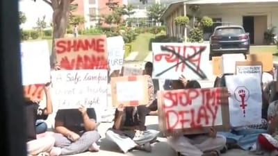 Students on Tuesday protested at the South Asian University campus in Delhi over the alleged sex assault case (ANI grab) Students on Tuesday protested at the South Asian University campus in Delhi over the alleged sex assault case (ANI grab)
