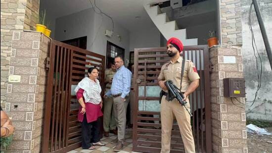 Dera Bassi police at the family’s house after the murder. (HT Photo)